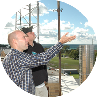Professor Steiger and student analyzing weather patterns Professor Steiger and student analyzing weather patterns