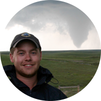 Kyle Piper and tornado in background Kyle Piper and tornado in background