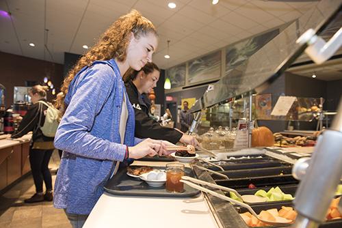 Student at Lakeside Dining Hall's salad bar