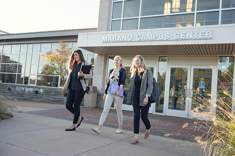 Students walking outside of Marano Campus Center