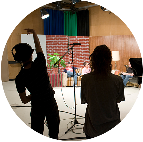 Communication studies students filming in studio