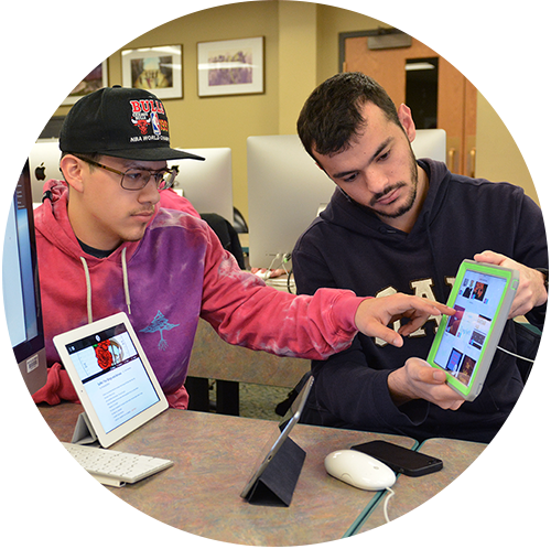 Two students in Lanigan's design and media lab