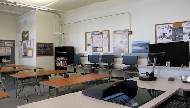 Classroom from podium perspective with the 4 student PC's 