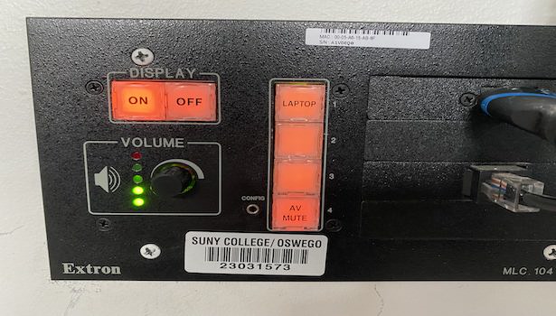 Photo of the input panel in the room showing the display option, volume and laptop selection 