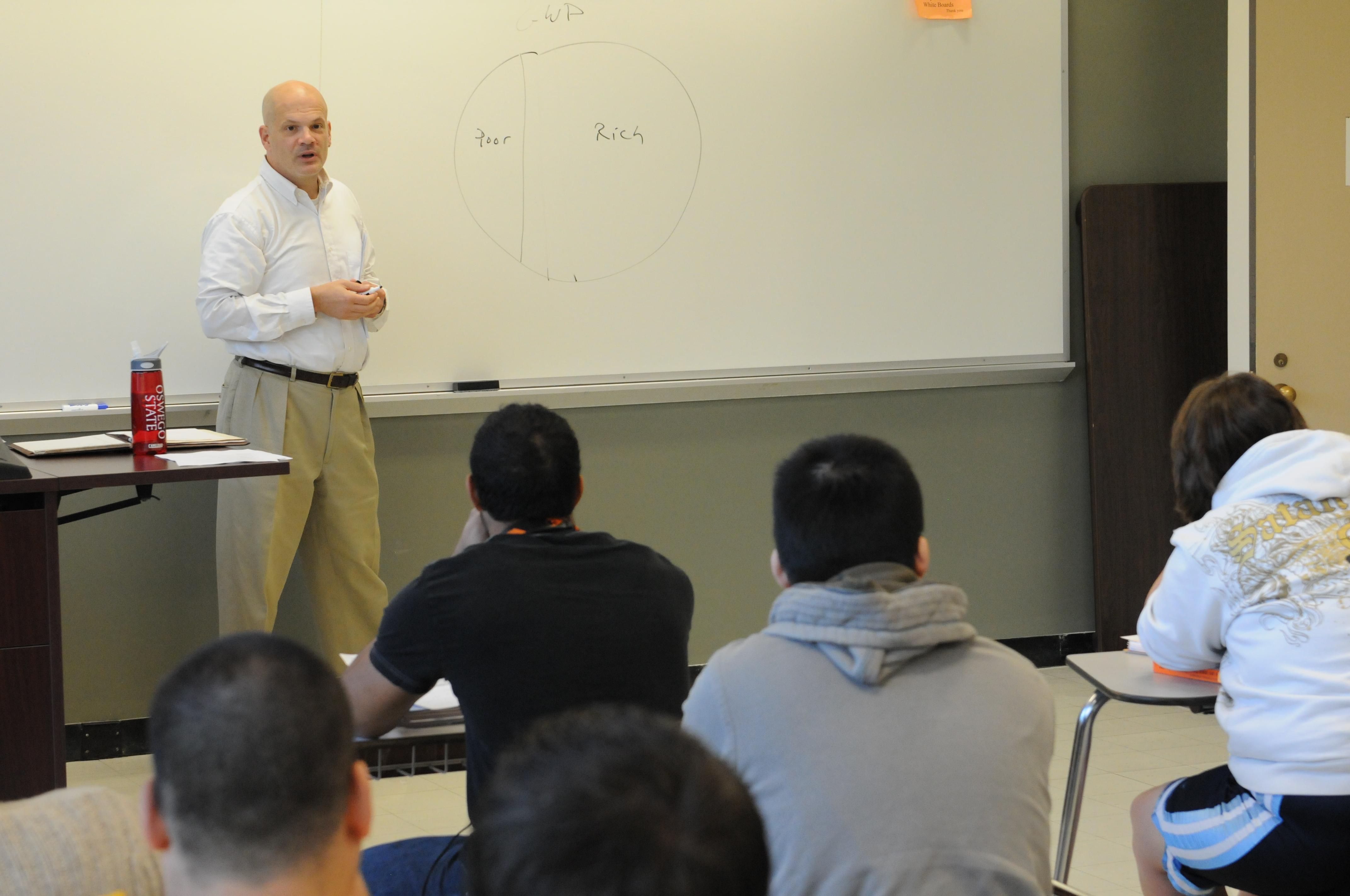 Professor David Andrews speaking to class