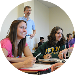 Students talking in economic class with professor