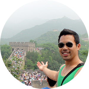 Study abroad student standing on the Great Wall of China