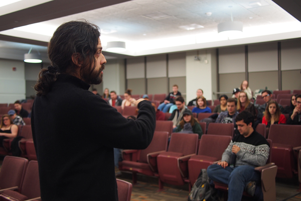 Cuban filmmaker Miguel Coyula during a screening of his work on campus.