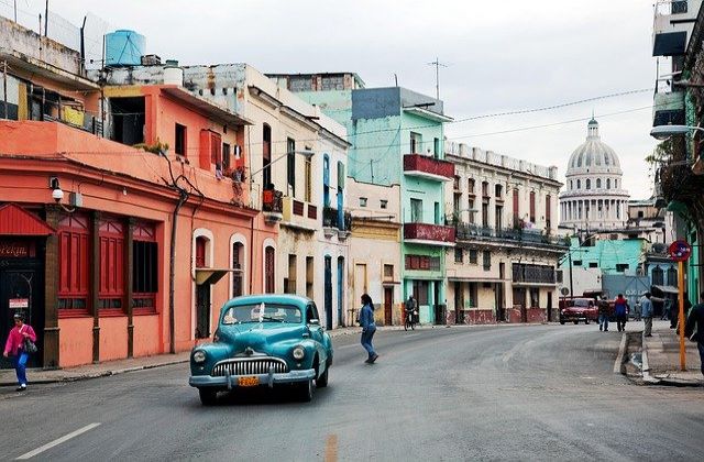 Old car in the colorful streets of Cuba