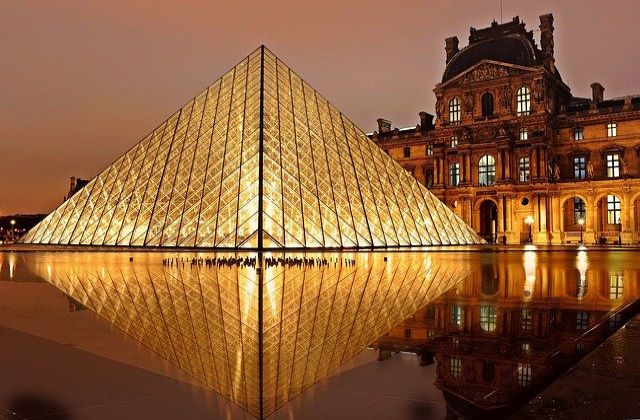 Lights shining inside the Louvre Pyramid 