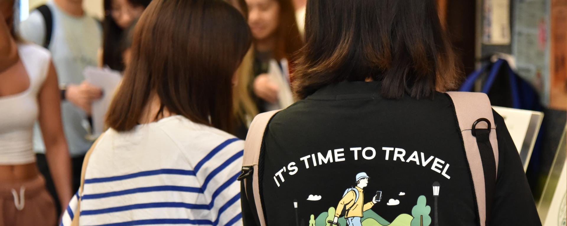 International students at SUNY Oswego's 2023 Fall Orientation in casual wear in a group setting on campus