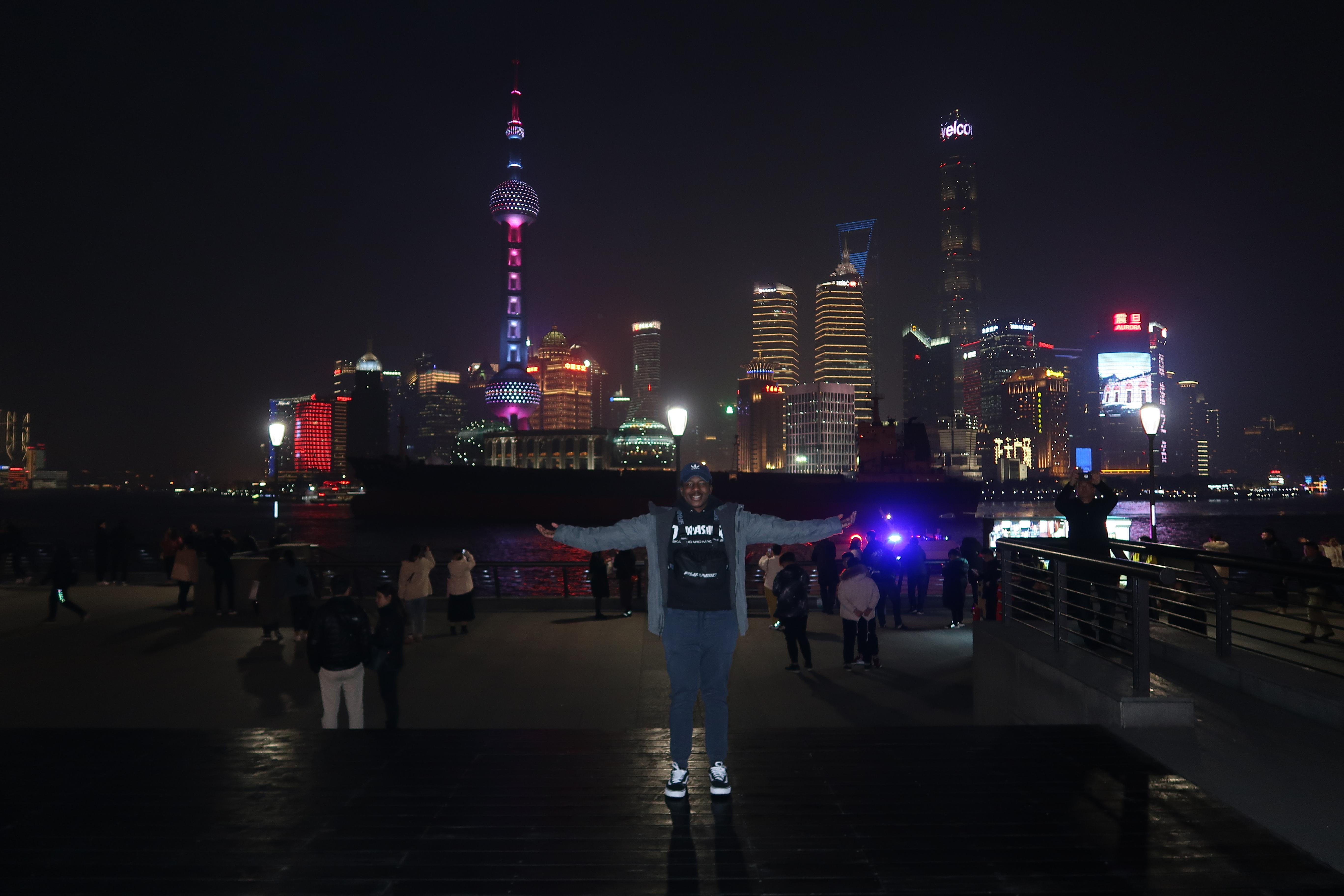 Diandre in front of Shanghai skyline