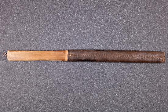 Hand whacker currently stored in Special Collections.