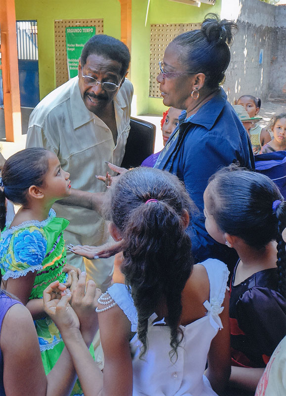 Al Frederick and Geneva Gay with pupils in Brazil