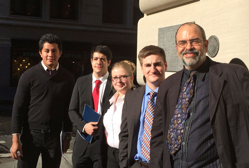 Students with professor Ranjit Dighe in New York City