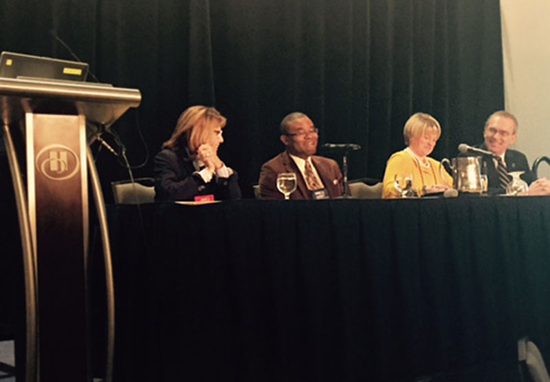 President Deborah F. Stanley with Executive Assistant Howard Gordon and other panelists