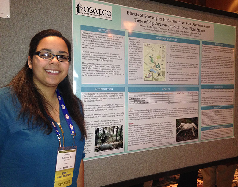 Brianna Robinson presenting a poster