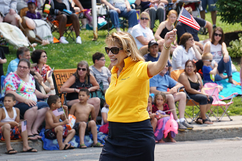 President Deborah F. Stanley serving as a grand marshal of the Oswego Independence Parade