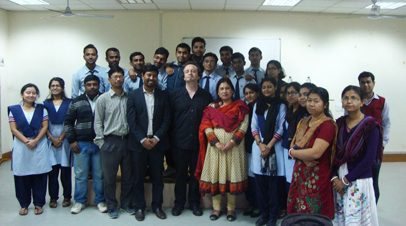 Damian Schfield with doctoral students at lecture