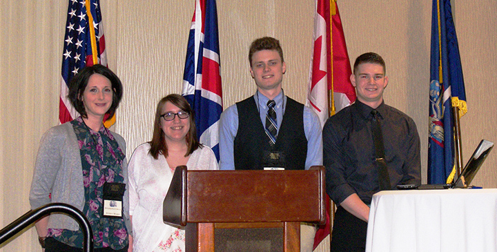 Four students who won competition at War of 1812 symposium