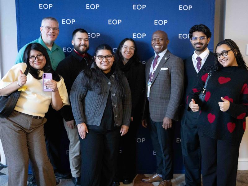President Nwosu, joined by EOP students and staff, accept an EOP Champion Award