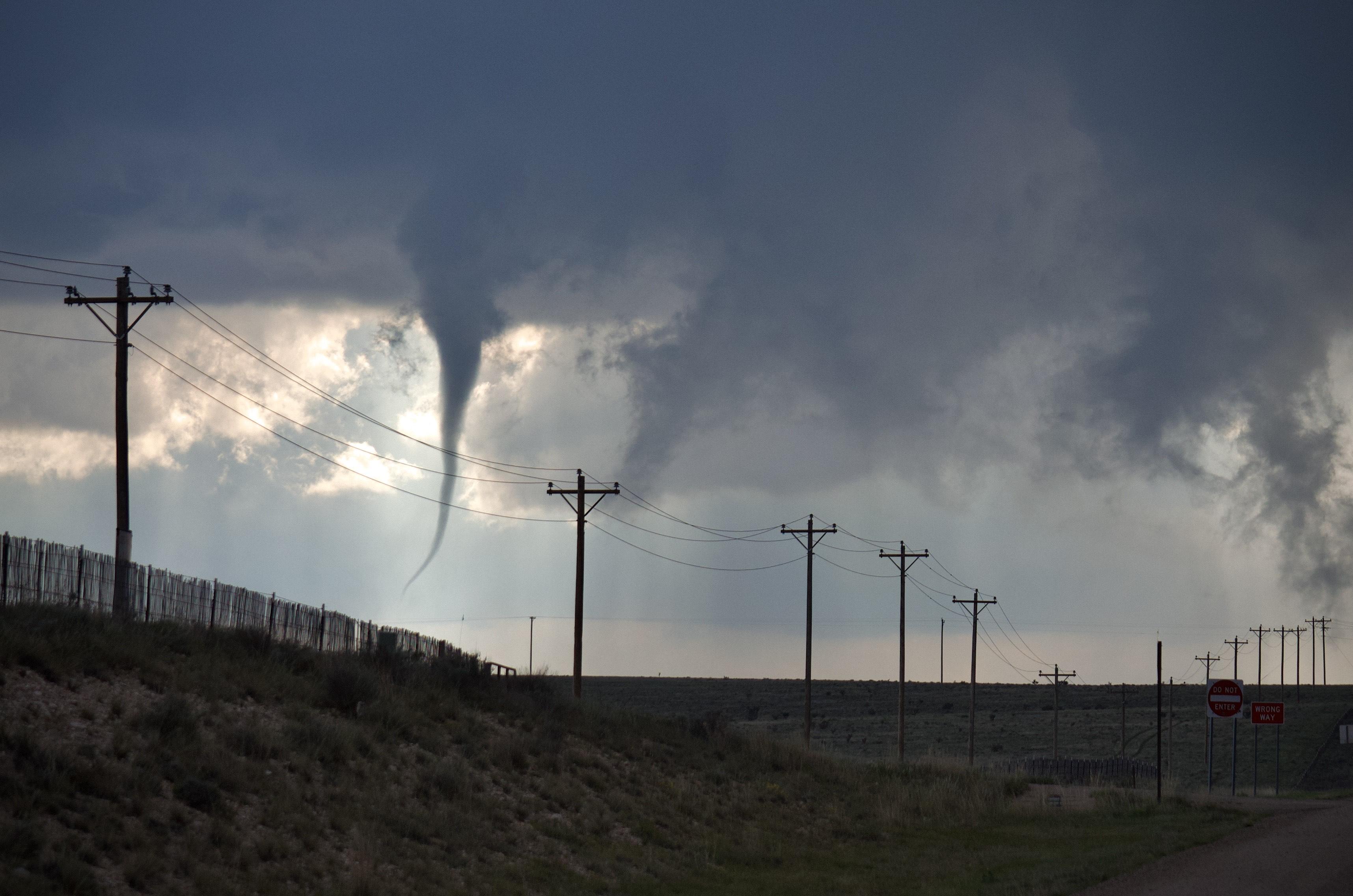 Funnel cloud in a stormy sky near the Texas Panhandle and eastern New Mexico.