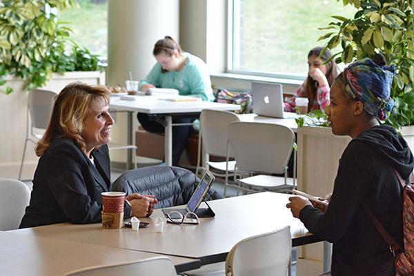 President Deborah F. Stanley meeting with students at a recently held Student Drop-In.