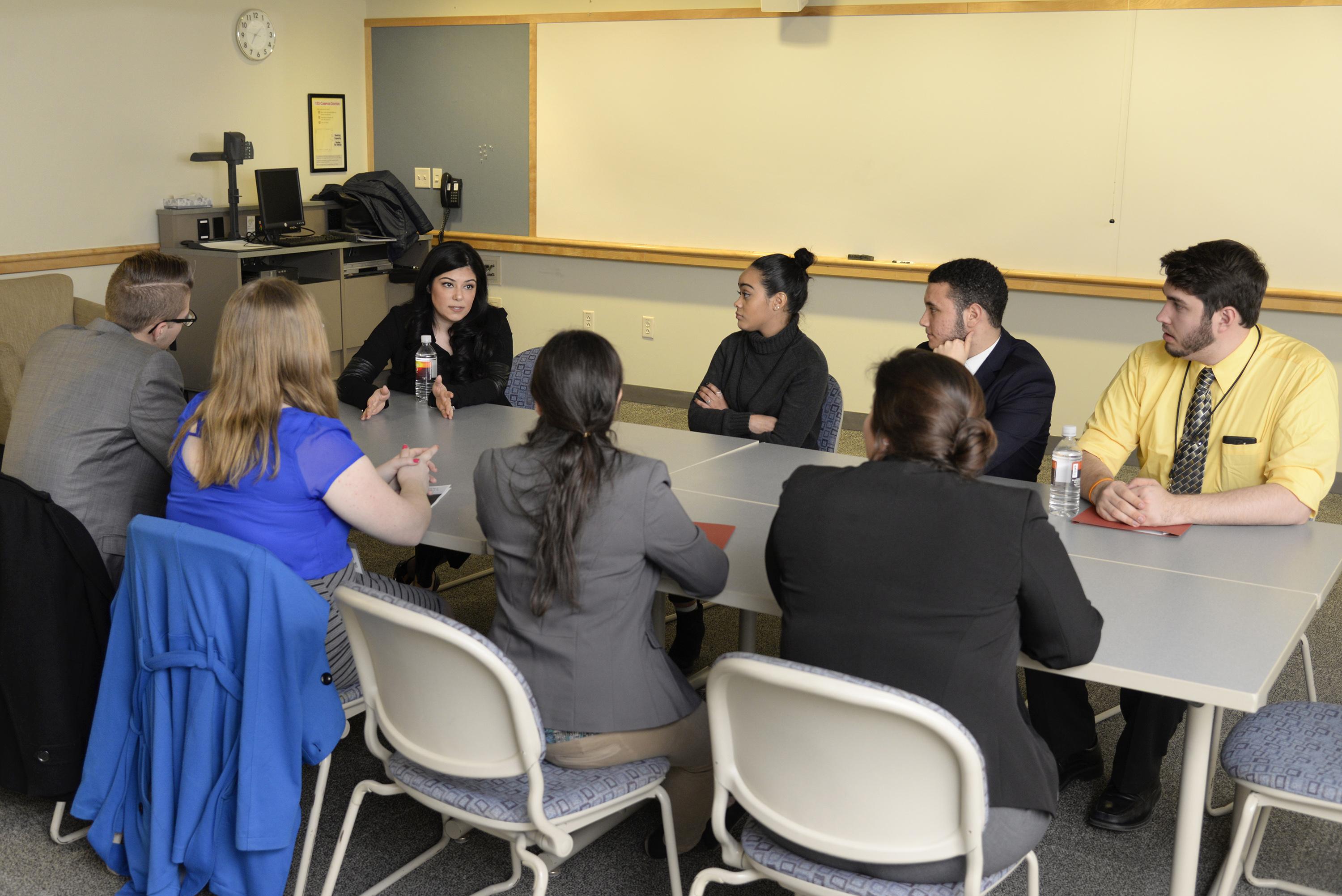 Ferial Govashiri speaking to students