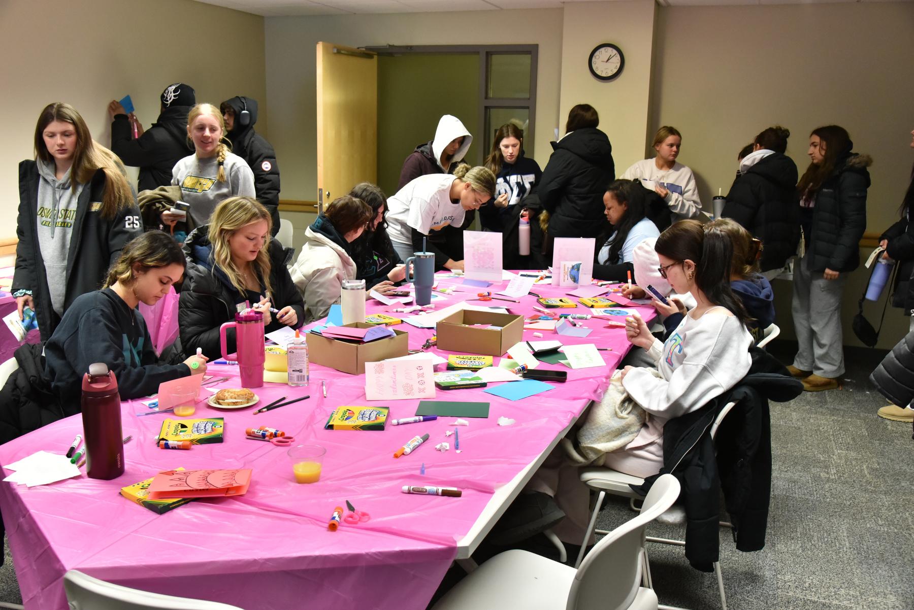 Students make cards for Valentine's Day and Easter for local senior citizens