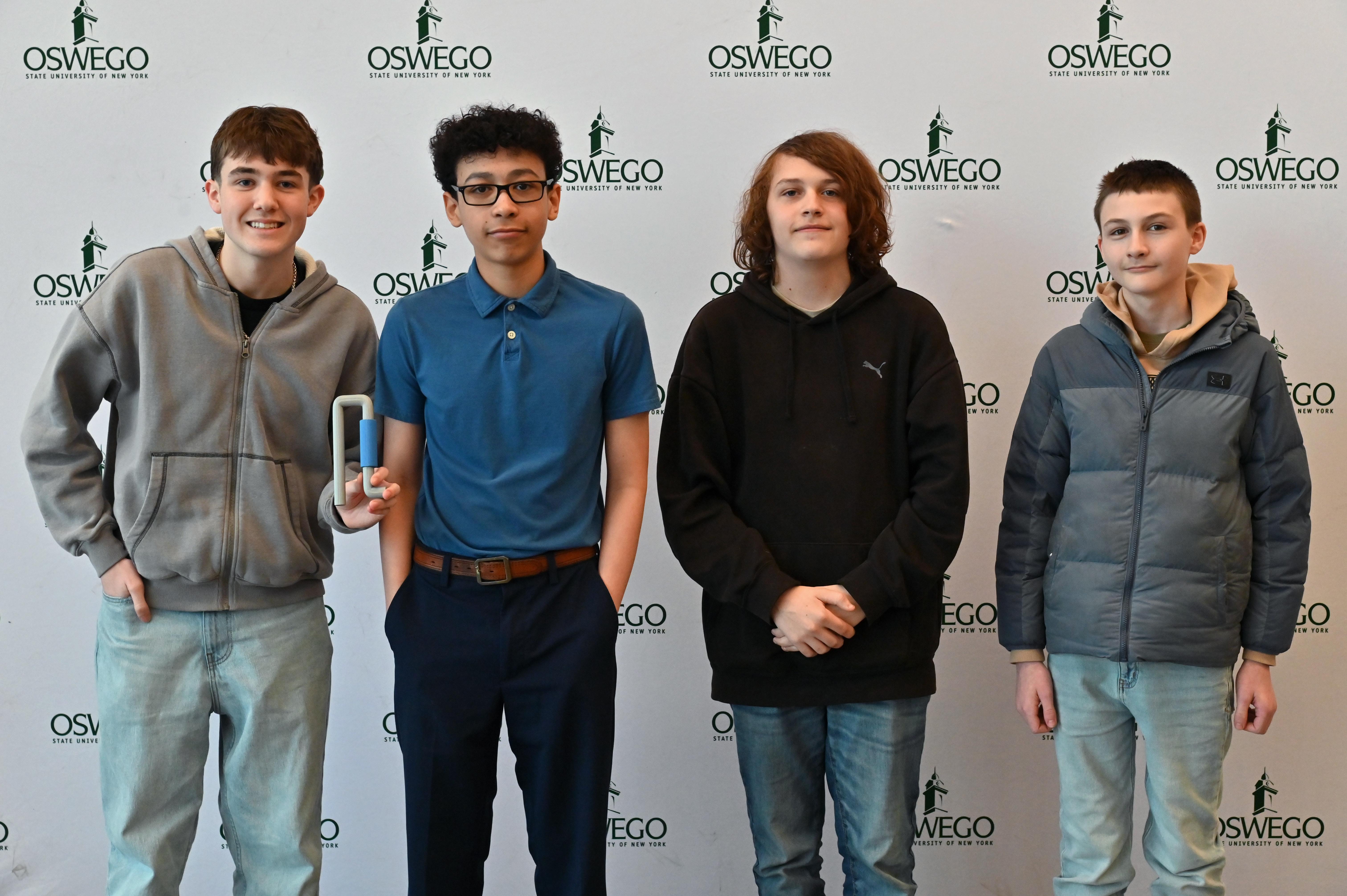 The Project Orion team won the first-ever Innovators Showcase at SUNY Oswego, a partnership between the university, CiTi BOCES’ P-TECH and Engineering Week sponsor Micron Technology. From left: Conner Falise, Wesley Elsner, Lucas Shaffner, Trenton Baker.
