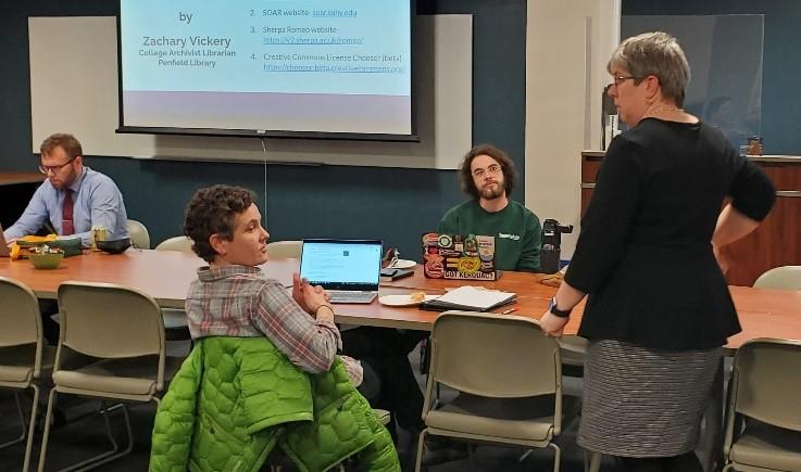 Photo from previous faculty and staff research party at Penfield Library