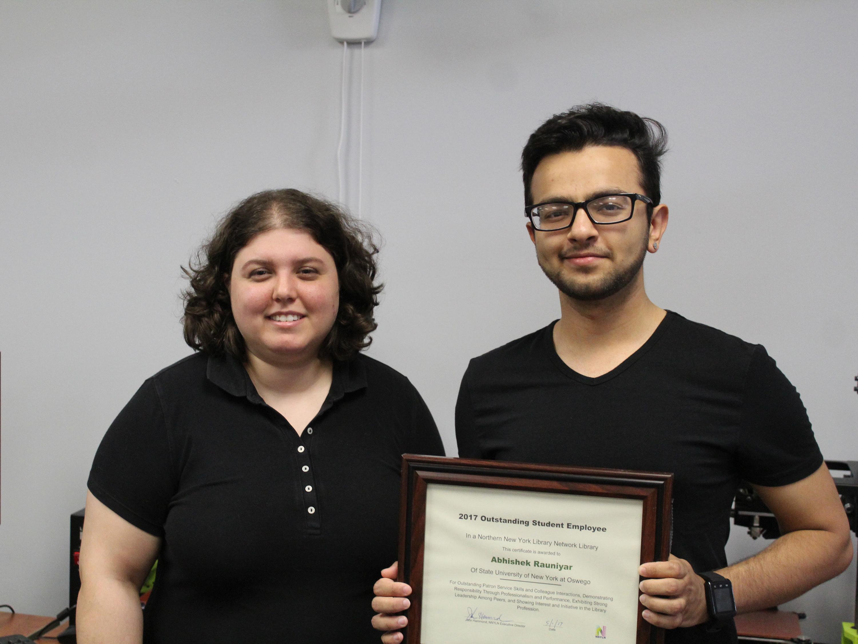 Abhishek Rauniyar at right with Sharona Ginsberg