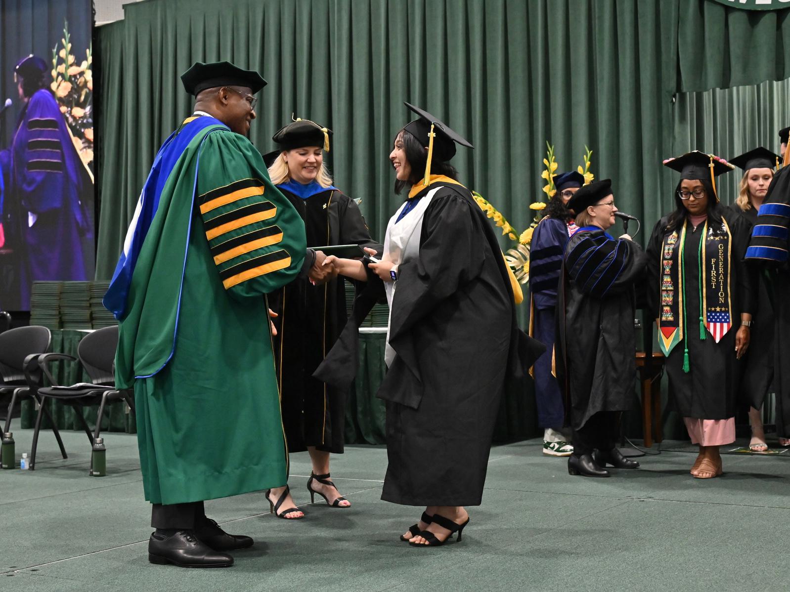 In just three years, Ayusha Bhandari transformed from a newly arrived international student from Pokhara, Nepal, into a summa cum laude graduate earning both bachelor’s and master’s degrees from SUNY Oswego. 