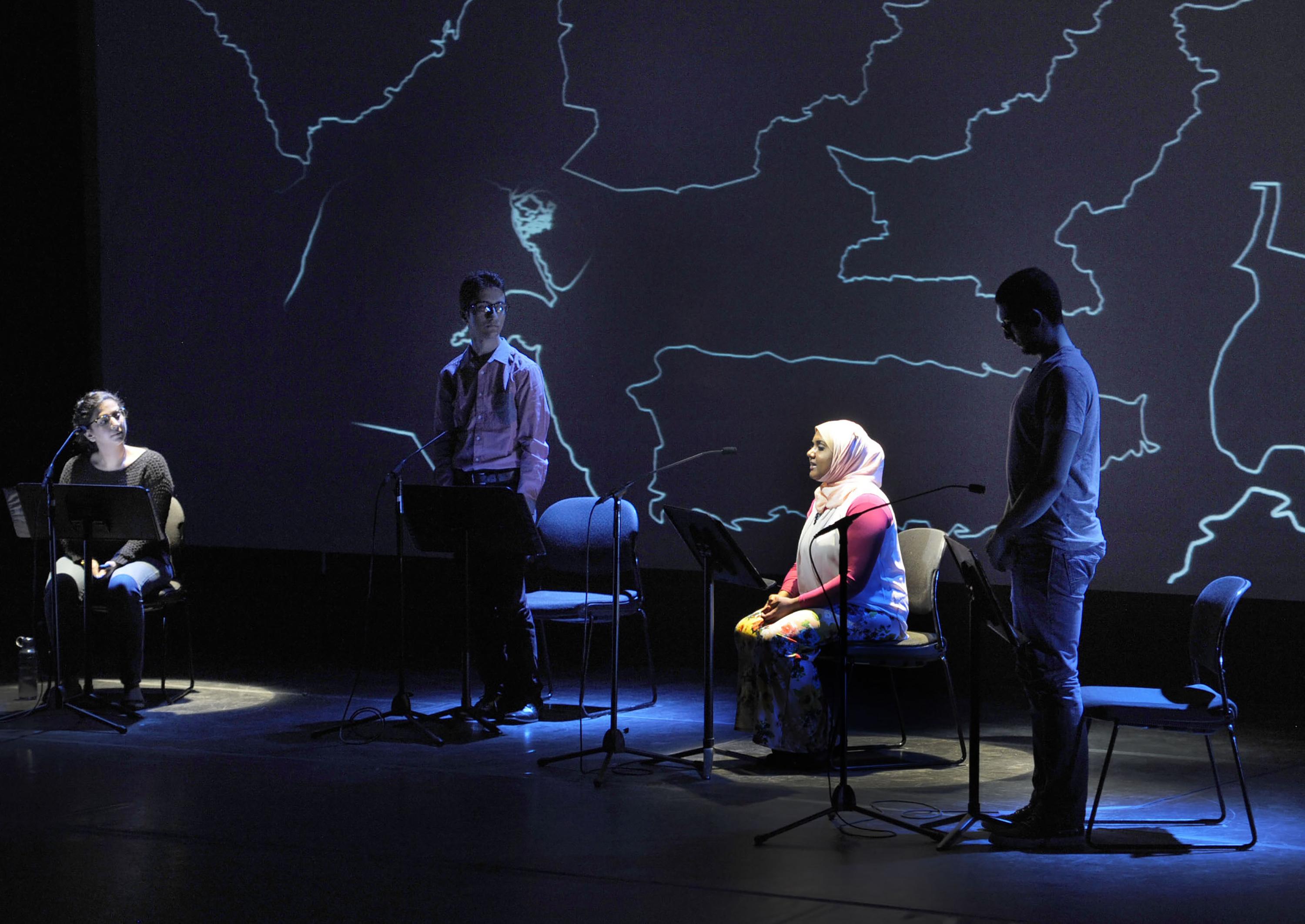 Participants take part in reading onstage for Beyond Sacred performance