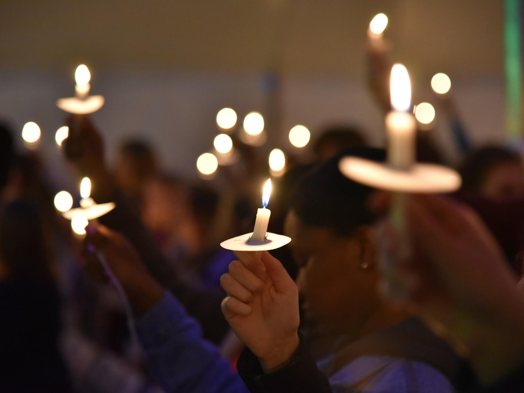 Torchlight is an annual ceremony at the beginning and end of the semester celebrating the torch of knowledge, symbolized by participants holding candles
