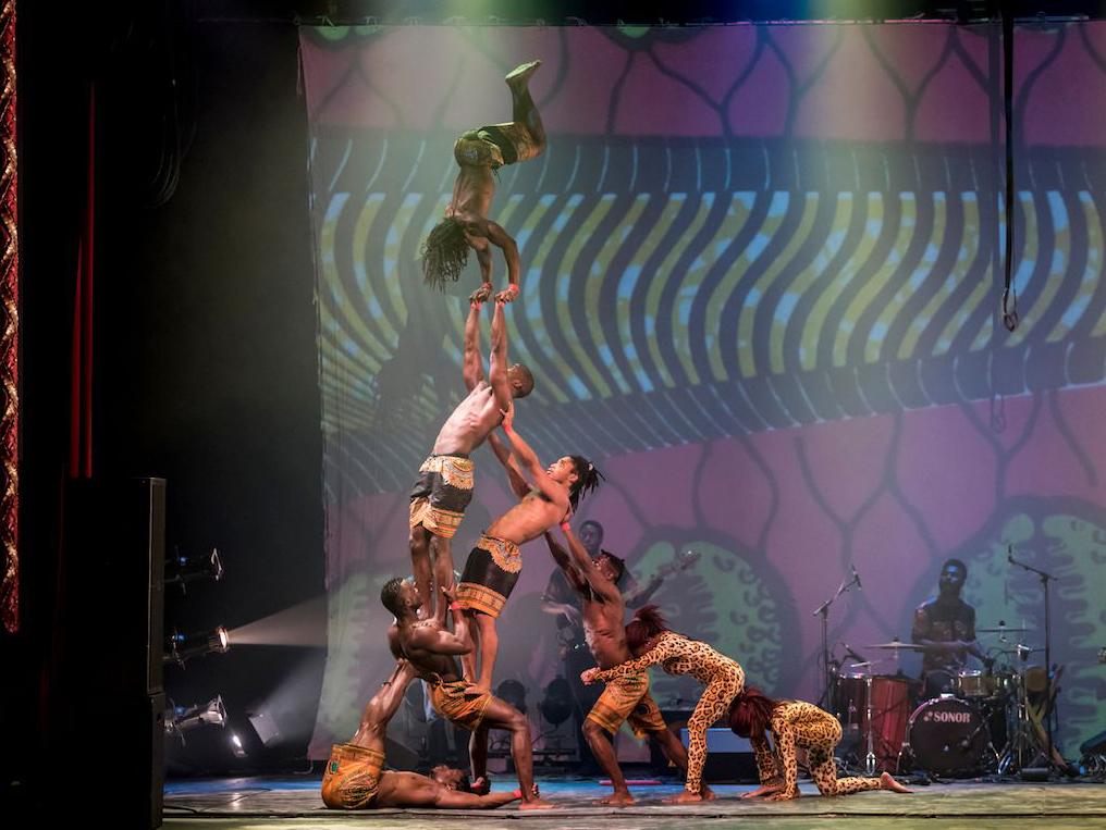 Cirque Kalabante performers stage an amazing acrobatic feat of a man doing a handstand atop a human pyramid