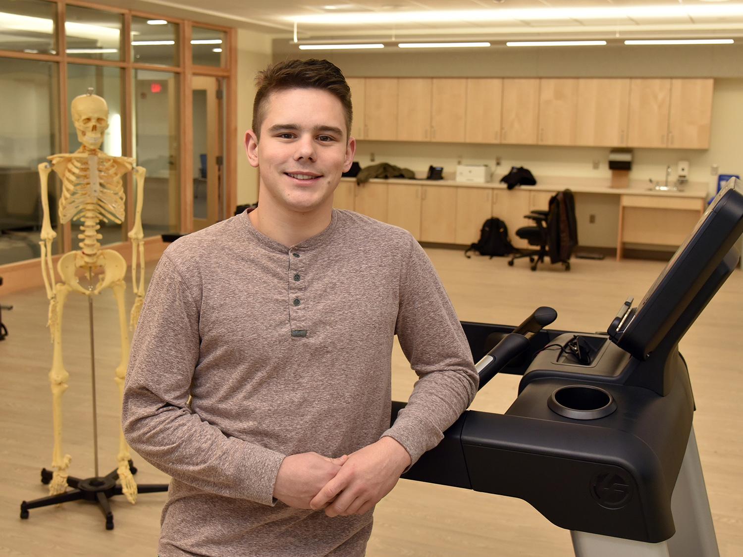 Student Maxim Kutepov in new laboratory of department of health promotion and wellness in Wilber Hall