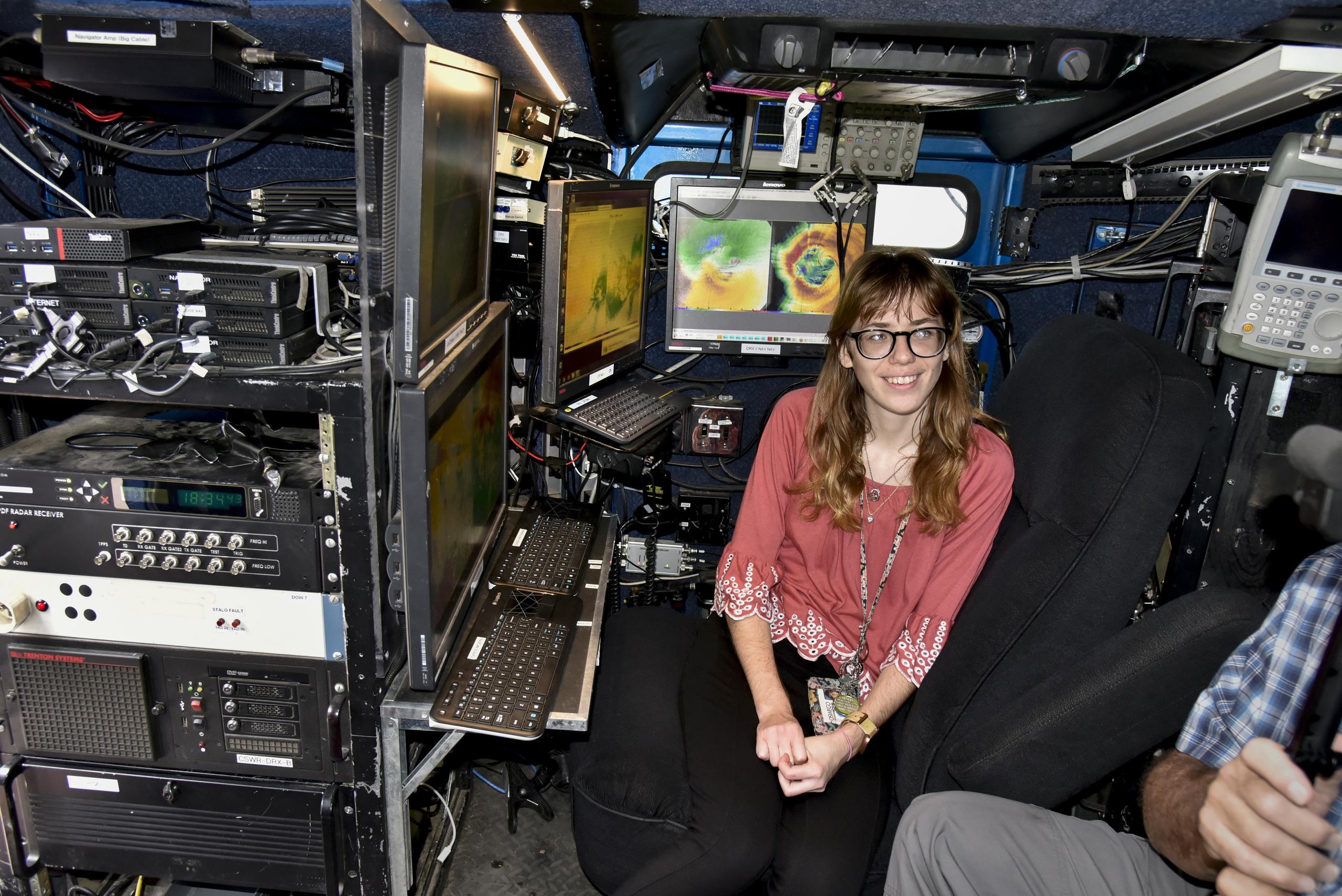 SUNY Oswego will host visit by the Doppler on Wheels high-tech mobile radar vehicle and more for STEM Community Day, from 2 to 5 p.m. on April 6. Samantha Karlsson, now a meteorology grad, sits in the Doppler on Wheels during a 2022 campus visit.