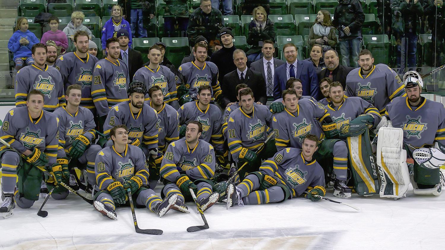 Hockey team, coaches celebrate Ed Gosek's 300th win