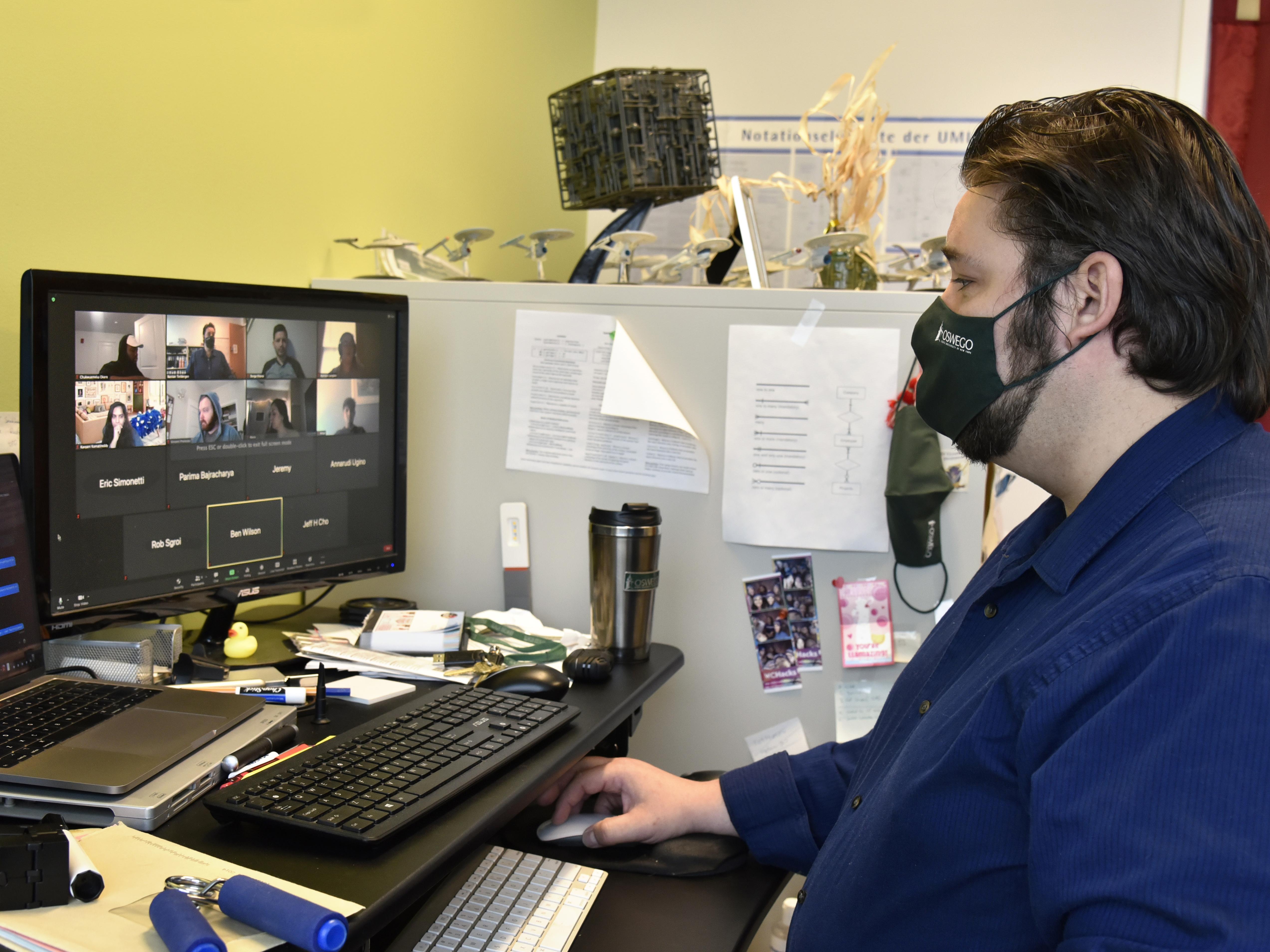 Bastian Tenbergen meets with his class virtually from his office in the Shineman Center