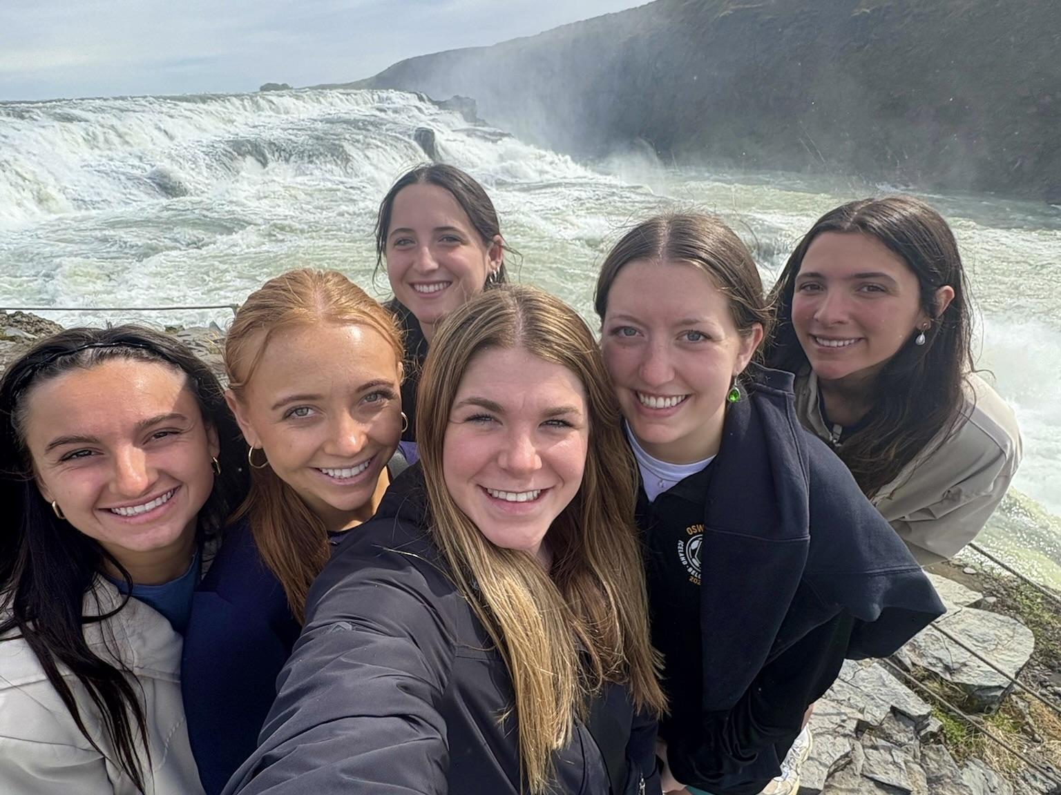 SUNY Oswego's women's soccer team visits the Gullfoss waterfall in Iceland.
