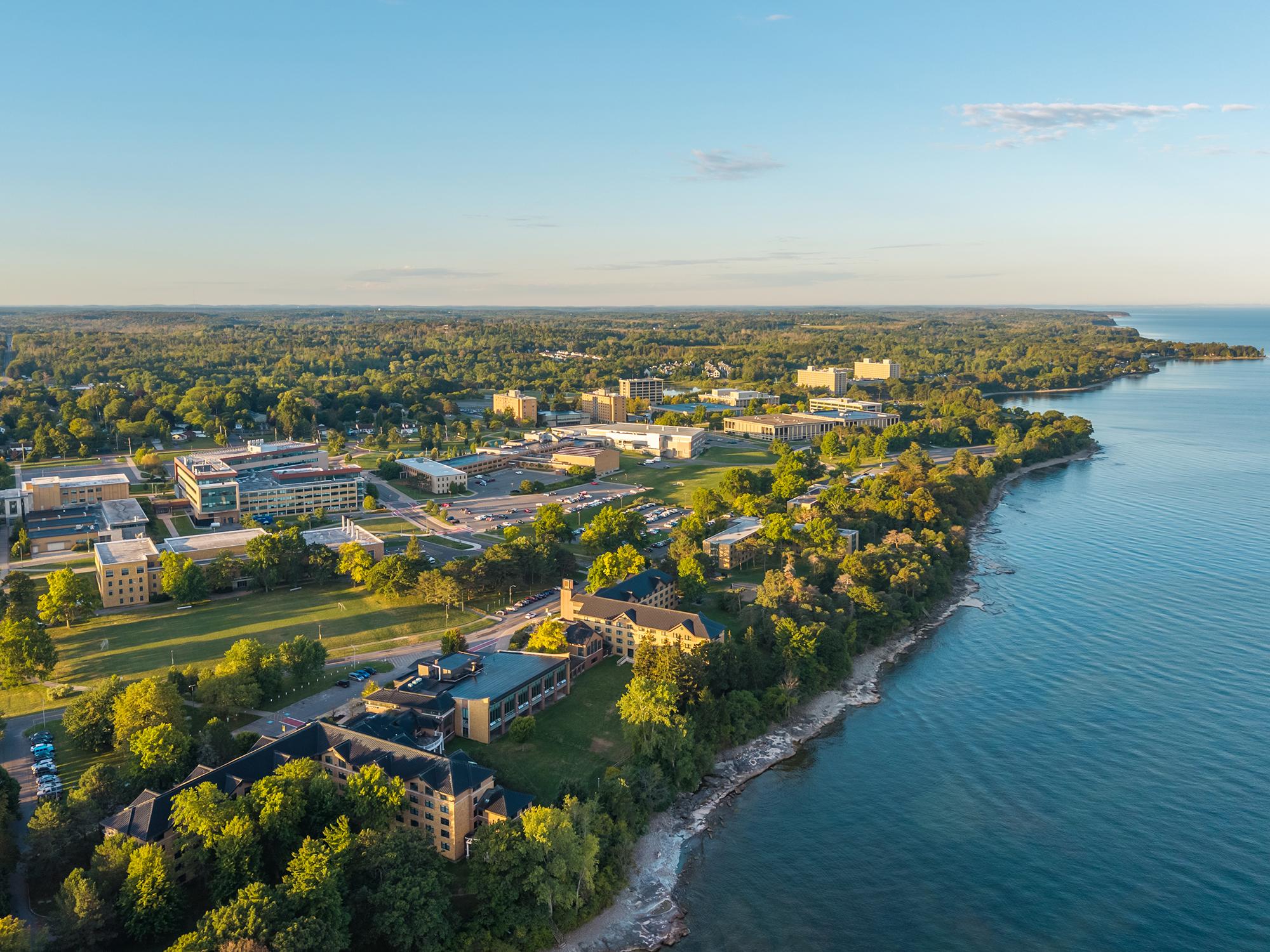 A scenic view of Lake Ontario and the SUNY Oswego campus via Kyle Meddaugh