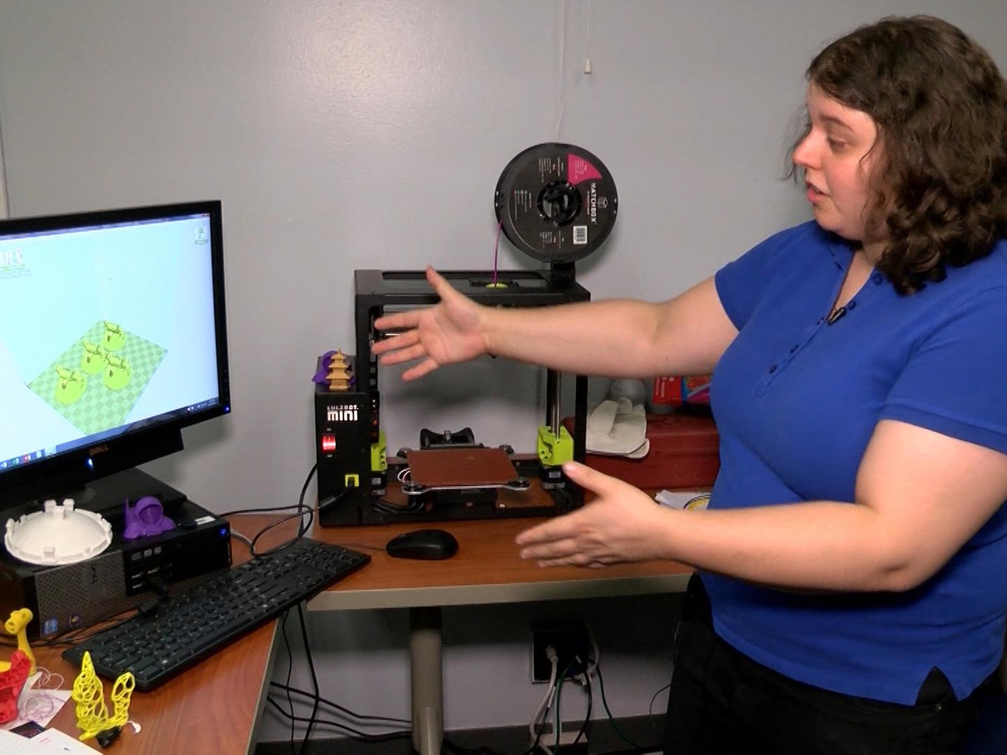 Sharona Ginsberg showing a 3D printer/computer station