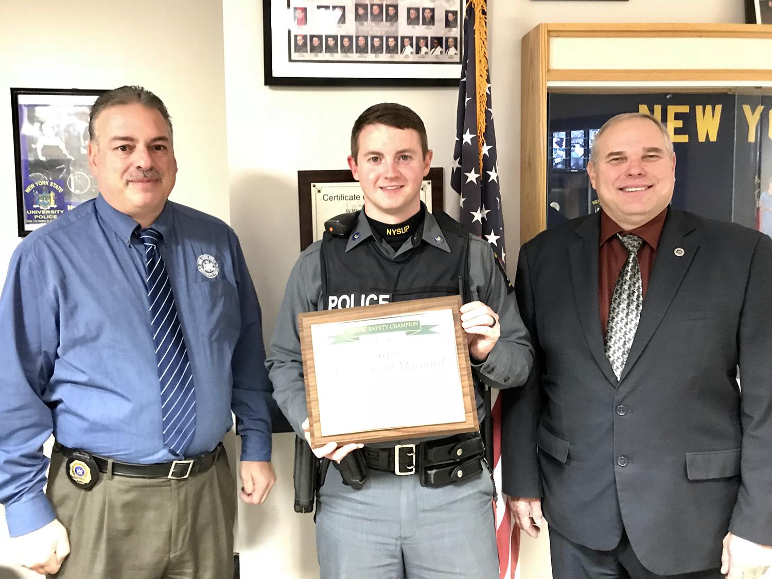 University Police Officer Kevin Maynard congratulated for traffic safety award