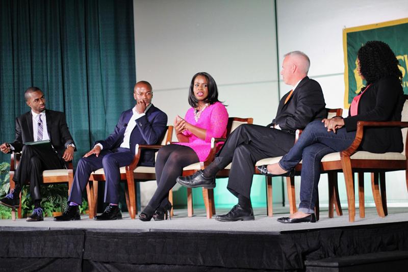 Media Summit panelists on stage during discussion