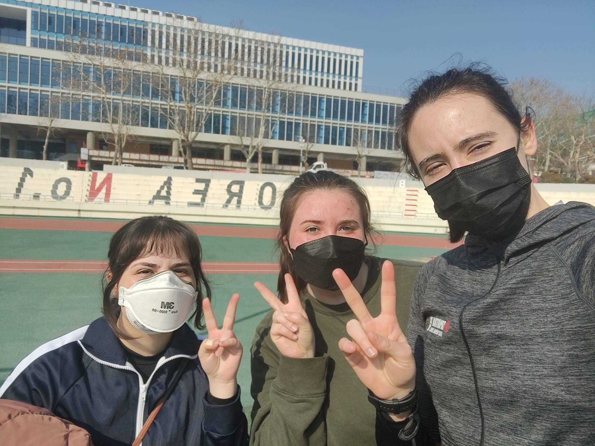 Oswego student Molly Bogart (center) explores Korea with some new friends