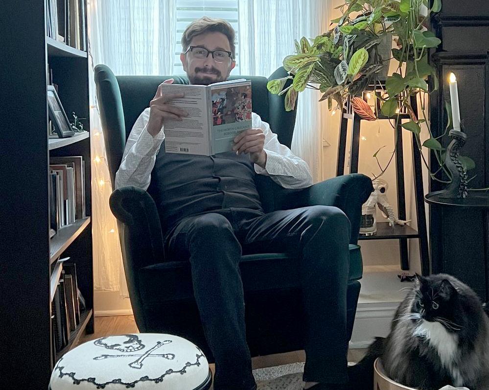 Murat Yasar with a copy of his popular book, “The North Caucasus Borderland Between Muscovy and the Ottoman Empire, 1555-1605"