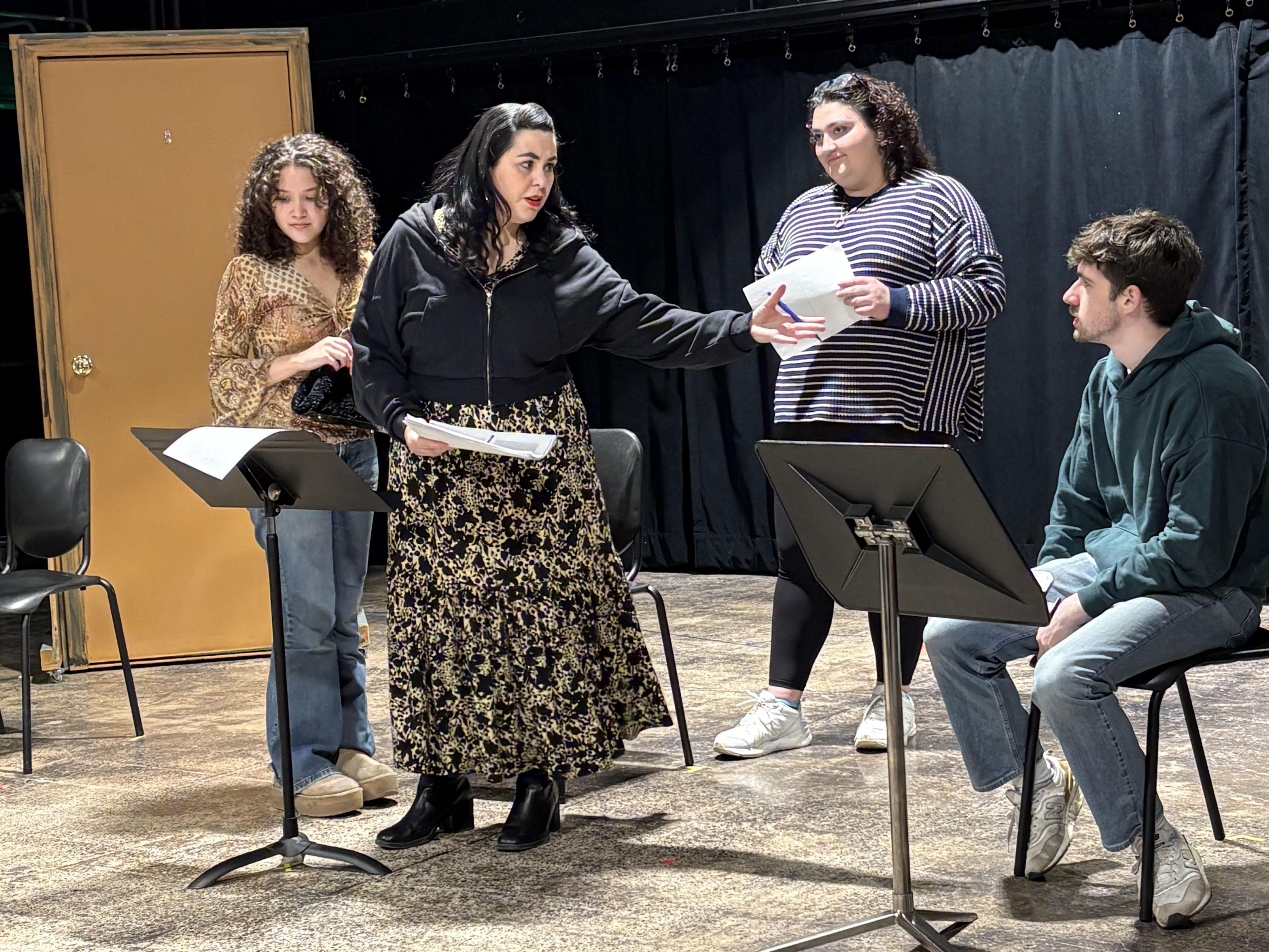 Bella Poynton, assistant professor of theatre, gives direction at a rehearsal for ""An Existential Staged Reading of Jean-Paul Sartre’s 'No Exit.'"