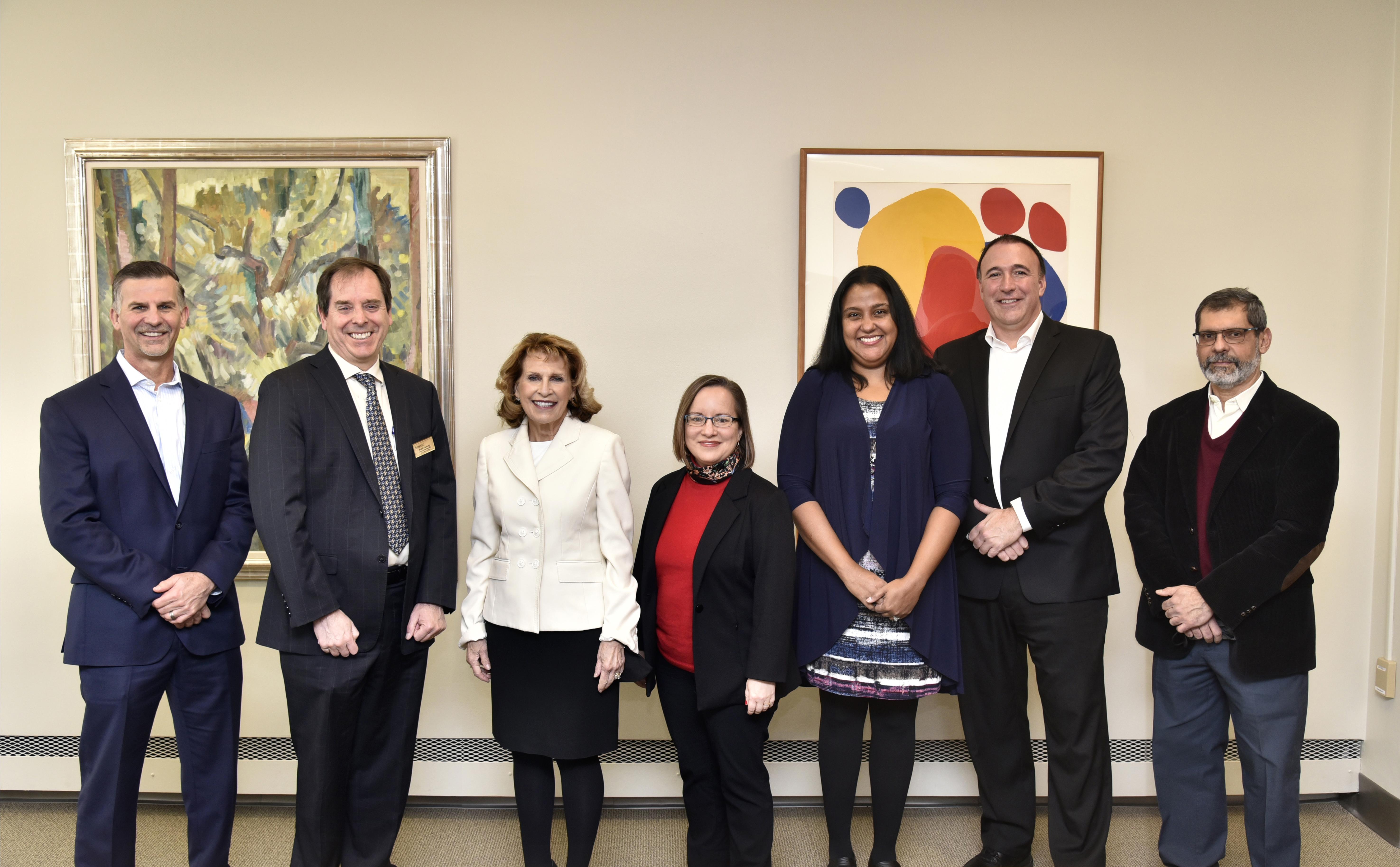 Administrators from Novelis and SUNY Oswego gather to celebrate the company's donation of $150,000 to SUNY Oswego to endow two scholarships for SUNY Oswego students with financial need.