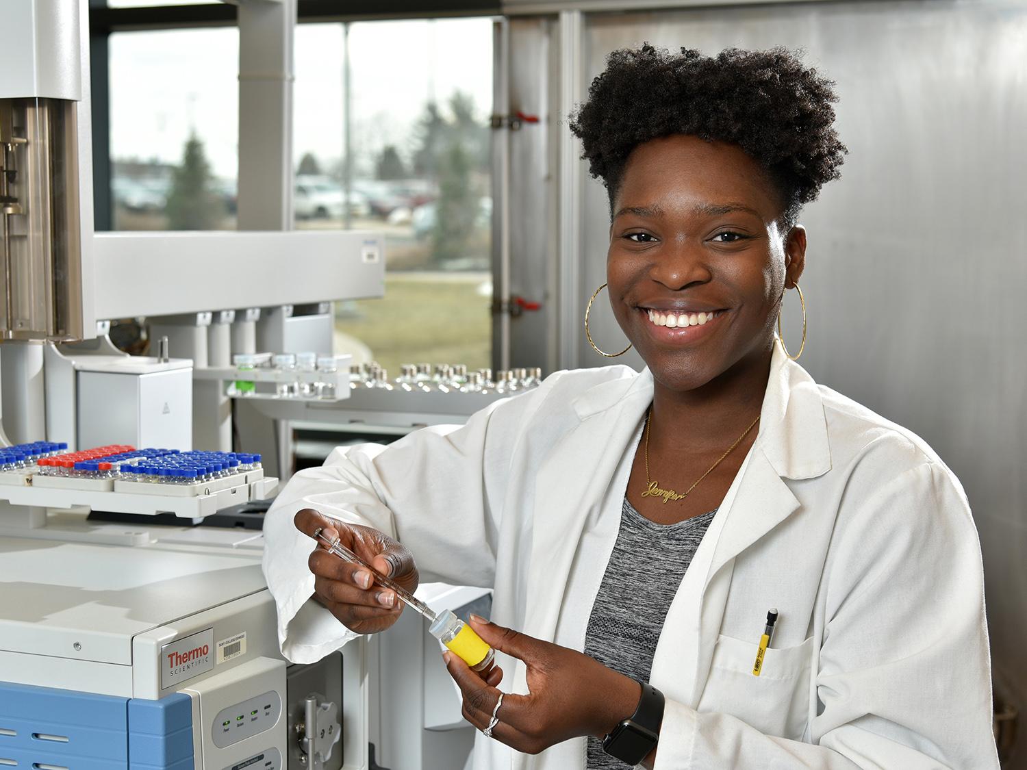 Jennifer Ofodile in a biochemistry lab